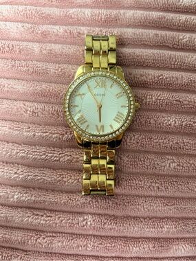GUESS Gold Crystal Bezel Roman Numeral Watch - Style W0444L2